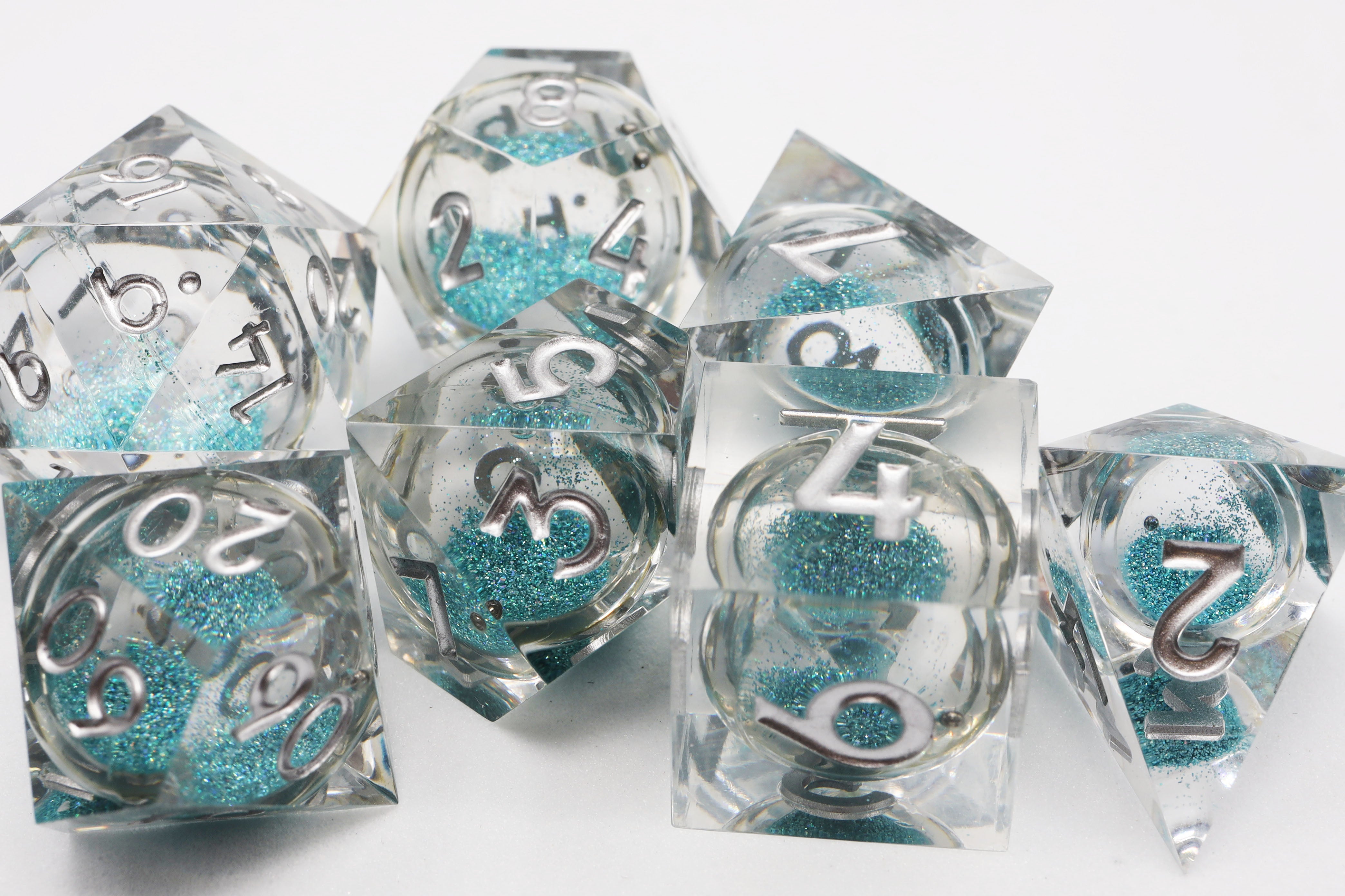 SKY BLUE LIQUID CORE SHARP EDGE RESIN RPG DICE SET Dice & Counters Foam Brain Games    | Red Claw Gaming