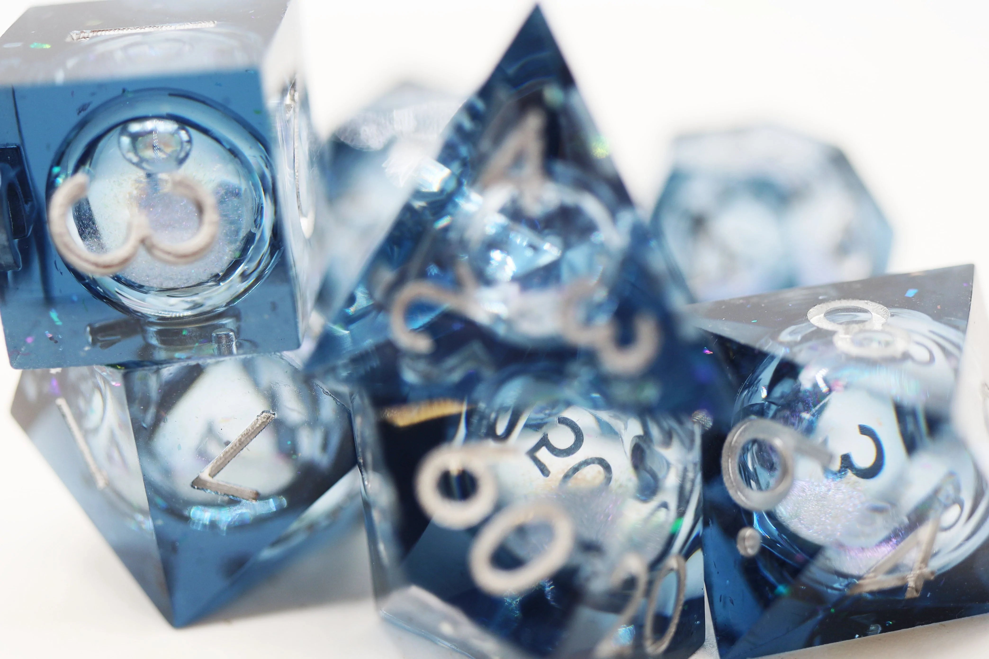 BLUE LIQUID CORE SHARP EDGE RESIN RPG DICE SET Dice & Counters Foam Brain Games    | Red Claw Gaming